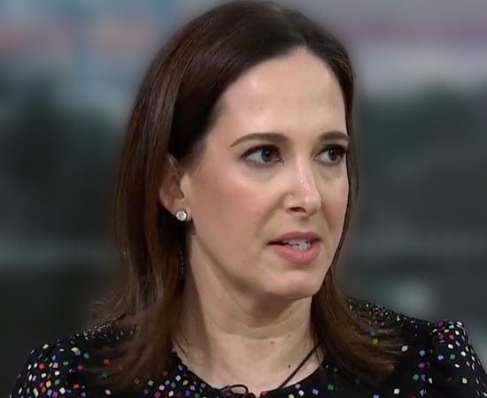 Lisa Rubin smiling during MSNBC interview segment in 2024