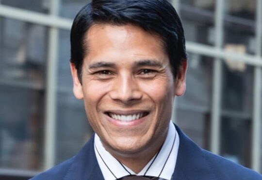 Nirav Tolia, CEO and co-founder of Nextdoor, speaking at a tech conference in 2025