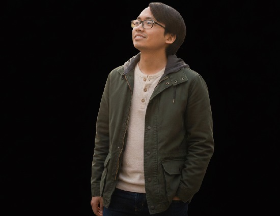 A close-up of crossword constructor Paolo Pasco during the 2026 Jeopardy! finals, showcasing the Gen Z champion's calm strategy.